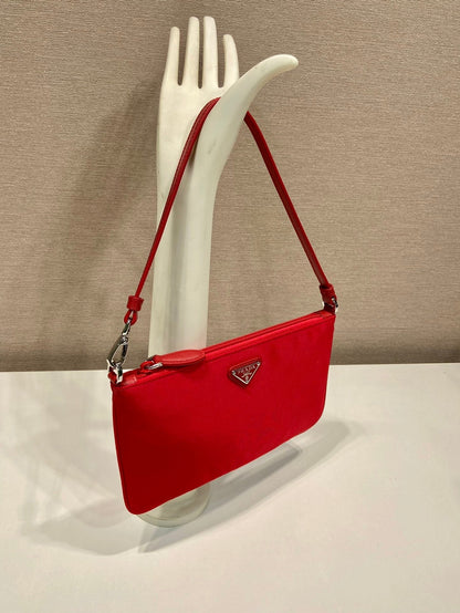 PRADA SHOULDER BAG 24 WITH TRIANGLE LOGO IN PASSION RED RE-NYLON FABRIC