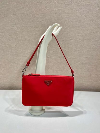 PRADA SHOULDER BAG 24 WITH TRIANGLE LOGO IN PASSION RED RE-NYLON FABRIC