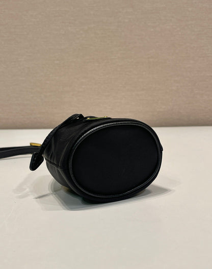 PRADA MINI BUCKET BAG 10 IN BLACK RE-NYLON AND SAFFIANO LEATHER STRAP