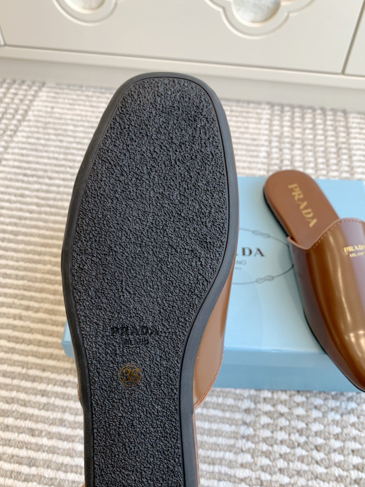 PRADA MULES IN BROWN GLOSSY SHEEPSKIN GOLD LETTERING LOGO