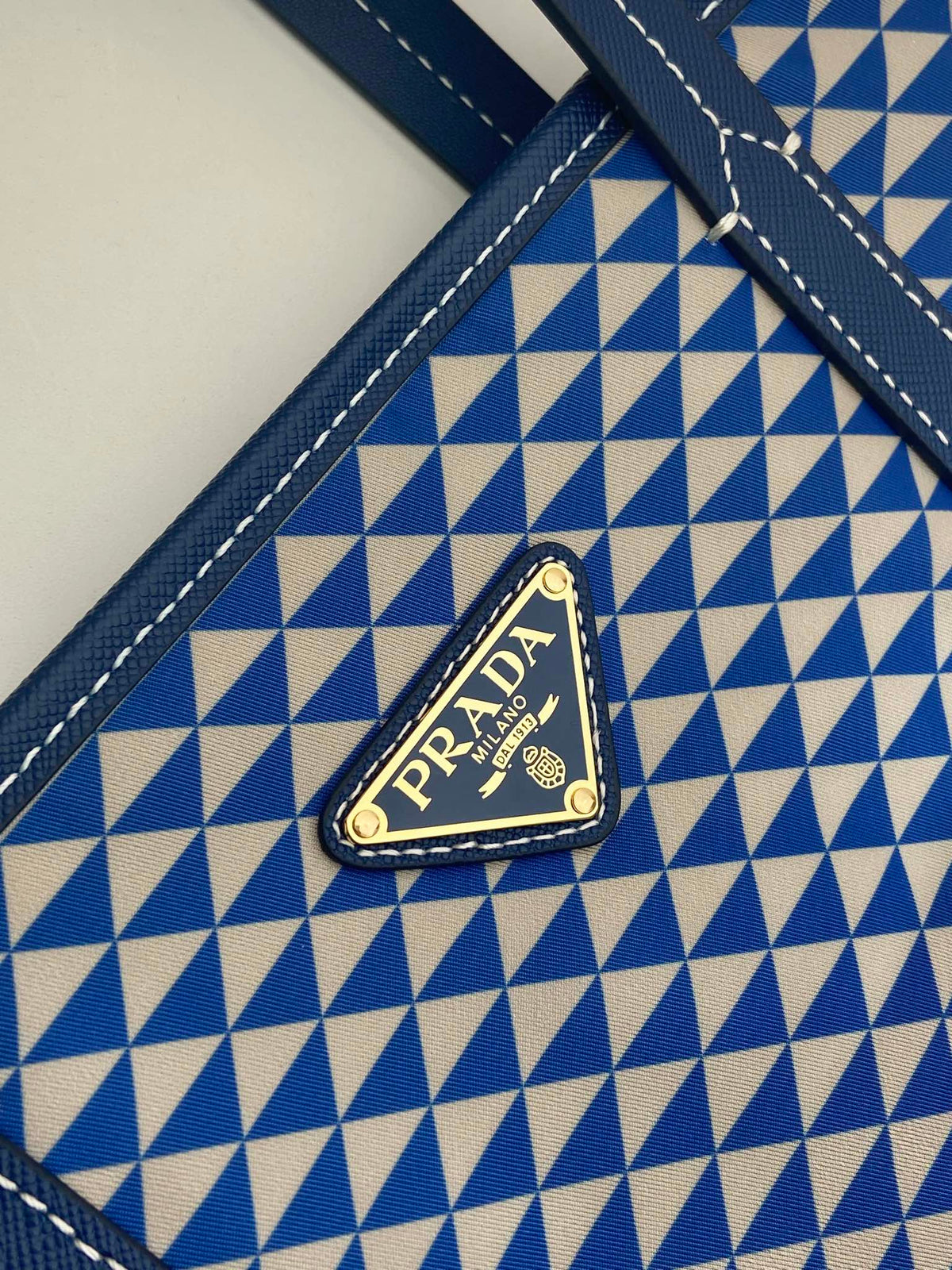 PRADA TOTE BAG 33 IN BLUE MIX WHITE TRIANGLE PATTERN EMBROIDERED FABRIC