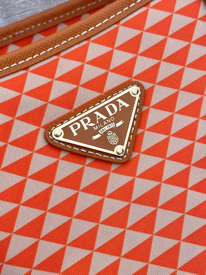 PRADA TOTE BAG 33 IN ORANGE MIX WHITE TRIANGLE PATTERN EMBROIDERED FABRIC