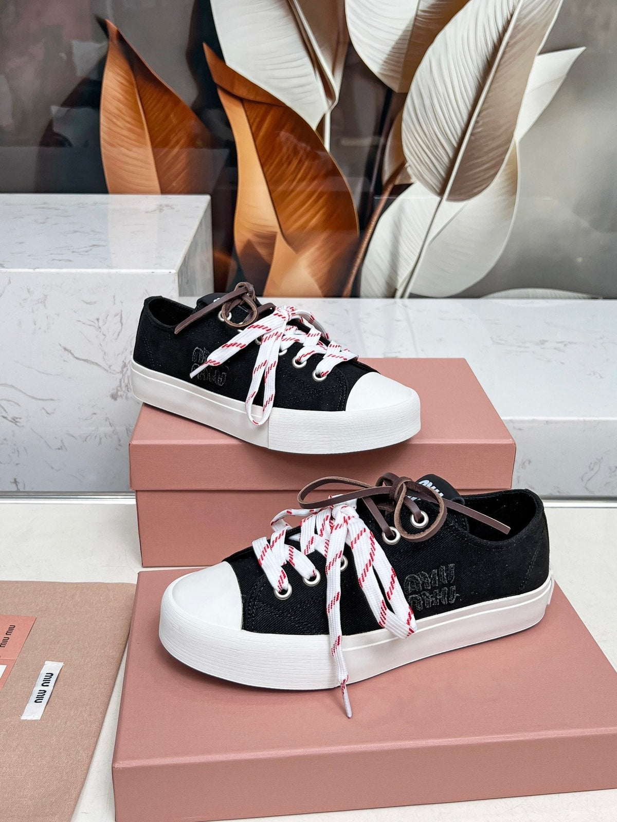 WASHED-DENIM SNEAKERS IN BLACK CANVAS WITH BROWN AND STRIPED LACES