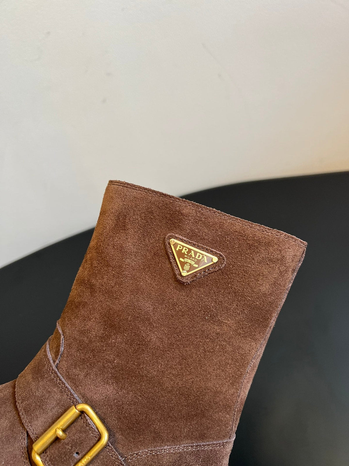 PRADA 25S PLATFORM ANKLE BOOTS IN BROWN SUEDE WITH GOLD HARDWARE