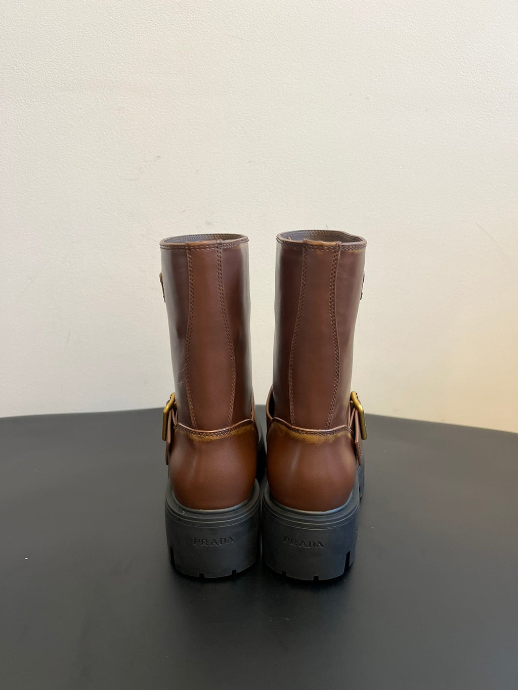 PRADA 25S PLATFORM ANKLE BOOTS IN BROWN CALFSKIN WITH GOLD HARDWARE