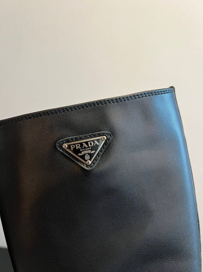 PRADA 25S HIGH-CUT PLATFORM BOOTS IN BLACK CALFSKIN WITH SILVER HARDWARE