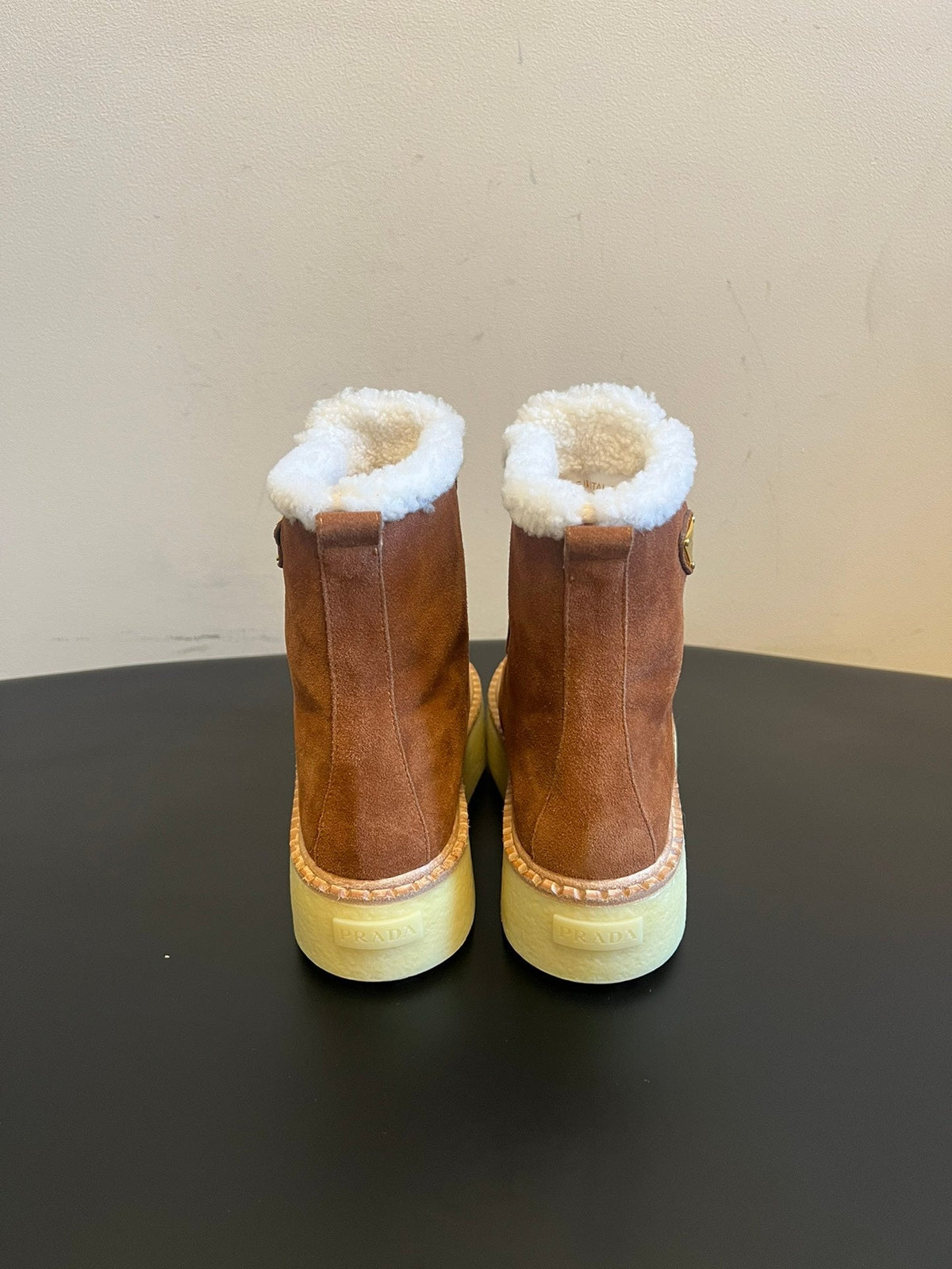 PRADA 25S PLATFORM ANKLE BOOTS 40 MM IN BROWN SUEDE SHEARLING-LINED
