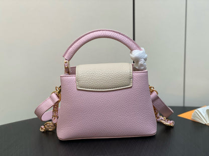 LOUIS VUITTON CAPUCINES MINI 21 IN LIGHT PINK TAURILLON LOVELOCK GOLD HARDWARE