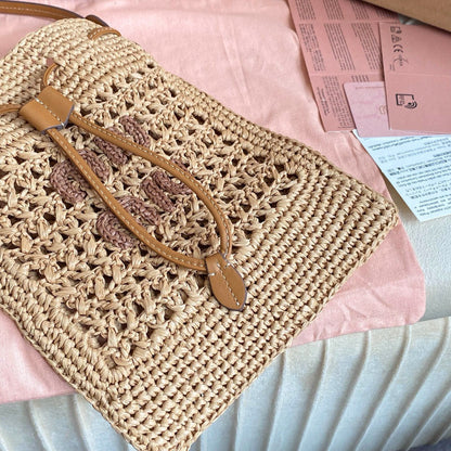 MIU MIU WANDER BUCKET BAG 23 IN NATURAL RAFFIA WITH LEATHER TRIM