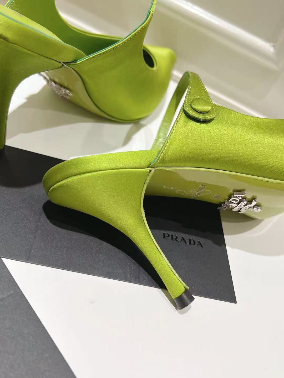 PRADA 75 POINTED SATIN MULES IN GREEN FLEECE HEEL