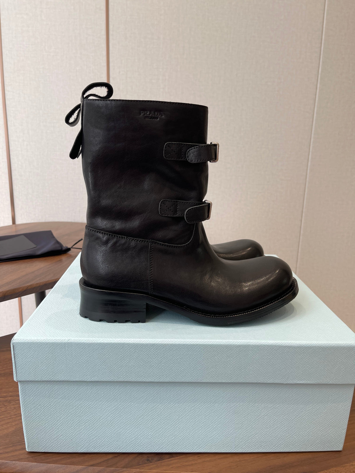 PRADA 25S TWO-BUTTON COWBOY BOOTS IN BLACK CALFSKIN WITH SILVER HARDWARE