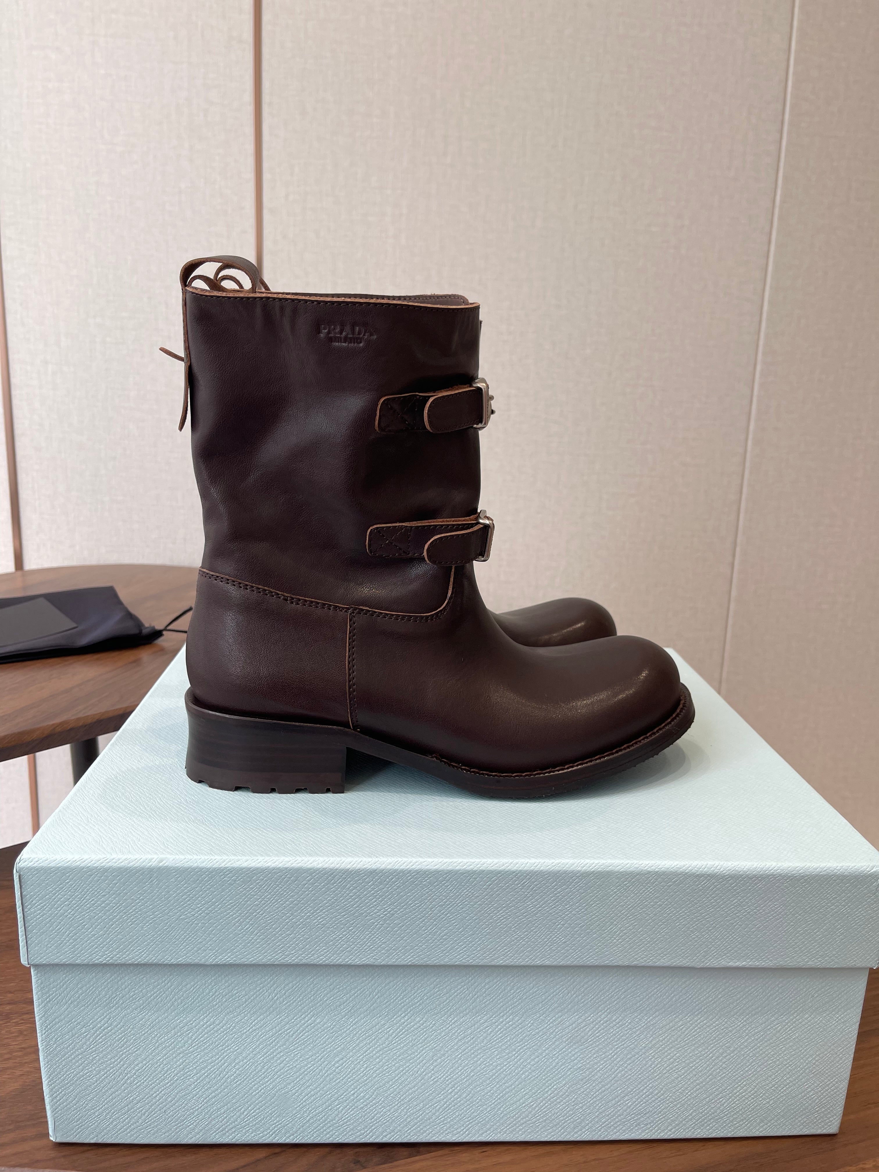 PRADA 25S TWO-BUTTON COWBOY BOOTS IN RK BROWN CALFSKIN WITH SILVER HARDWARE