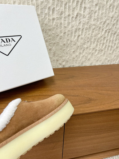 PRADA 25S PLATFORM FUR-LINED MULES IN BROWN SUEDE