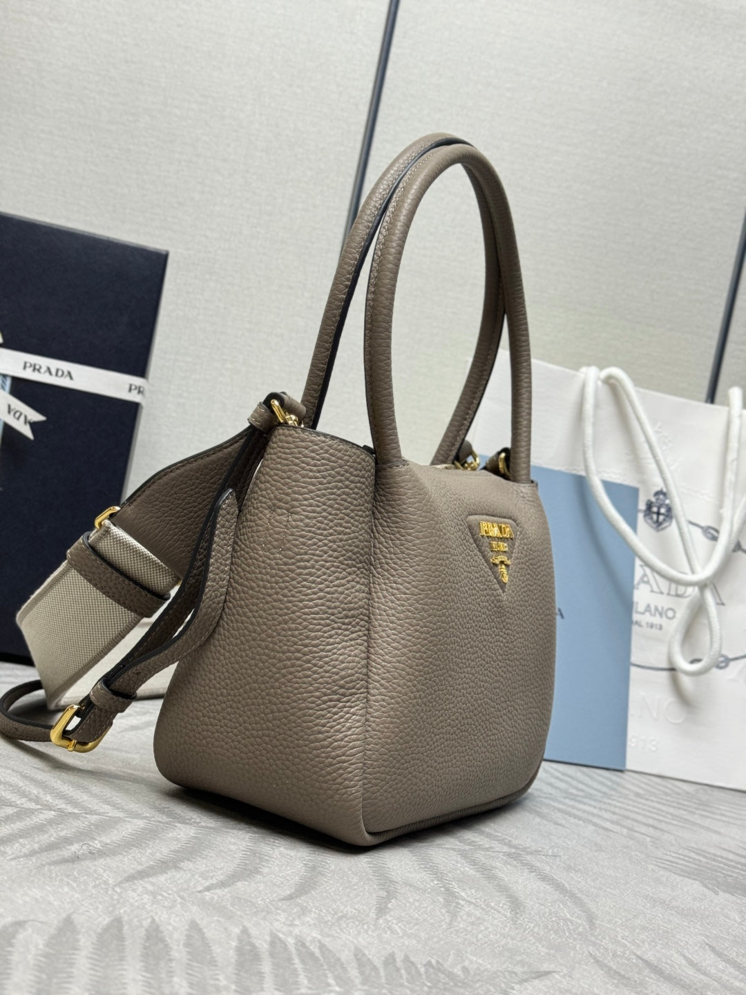 PRADA 25S SMALL BAG 23 IN TAUPE CALFSKIN GOLD HARDWARE