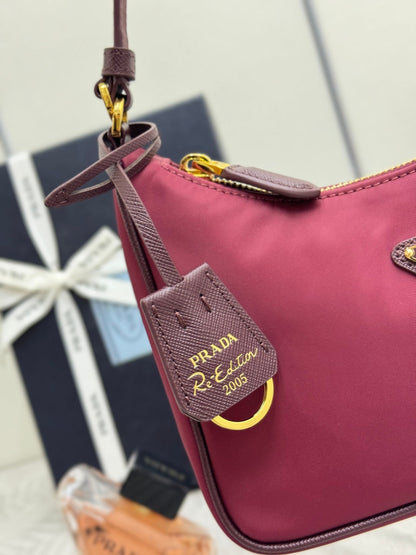 PRADA 25S RE-EDITION 2005 MINI BAG 22 IN BURGUNDY RE-NYLON AND SAFFIANO