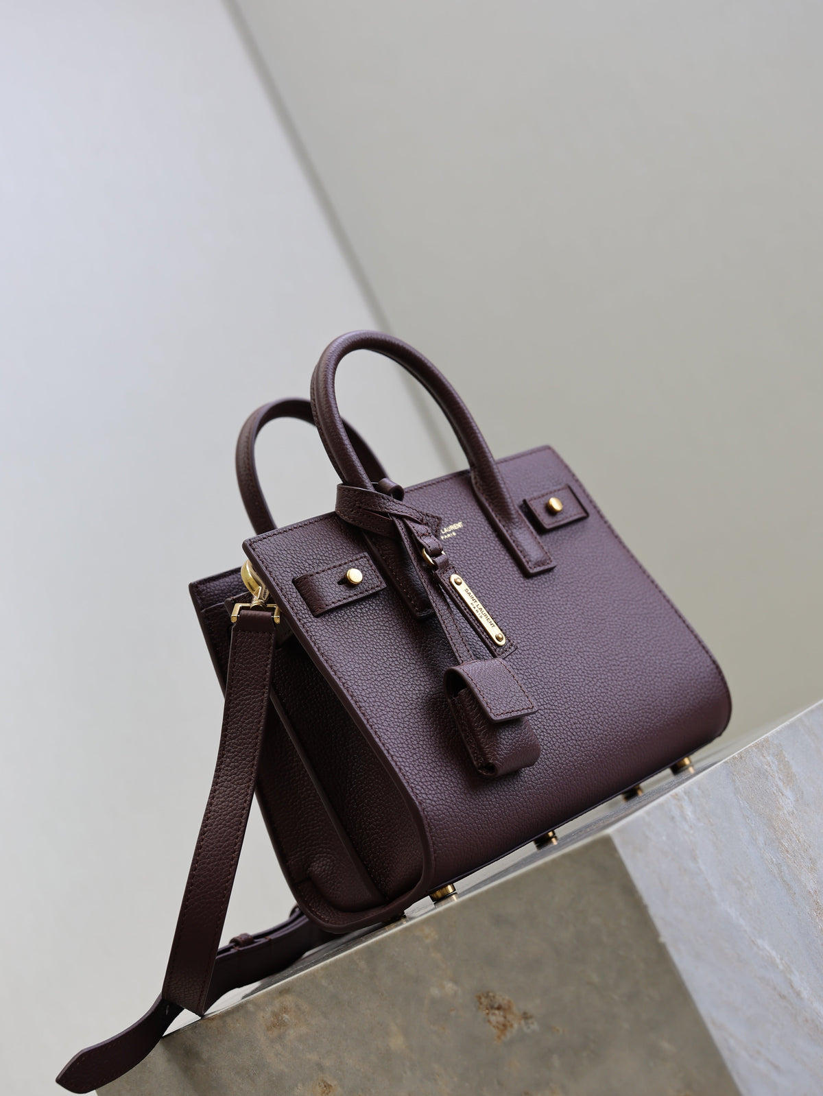 SAINT LAURENT YSL 25S SAC DE JOUR 22 IN ROUGE CABERNET SUPPLE GRAINED CALFSKIN