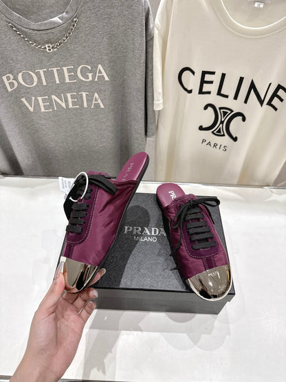 PRADA 25S MULES IN PLUM WITH METAL TOECAP