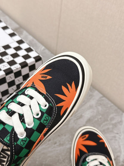 VALENTINO 25S GARAVANI X VANS SNEAKERS IN GREEN MIX BLACK CANVAS