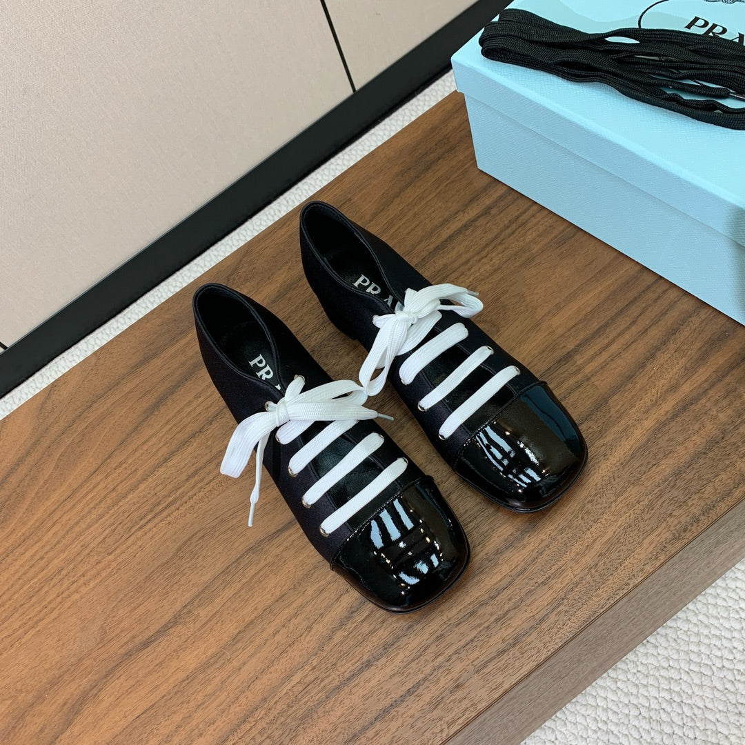 PRADA LACE-UP HIGH SHOES IN BLACK SILK MIX GLOSSY CALFSKIN
