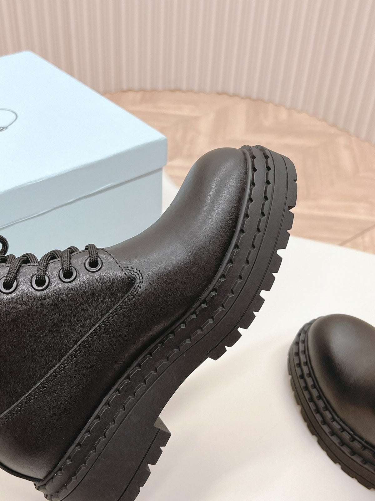 PRADA LACE-UP BOOTS BLACK CALFSKIN