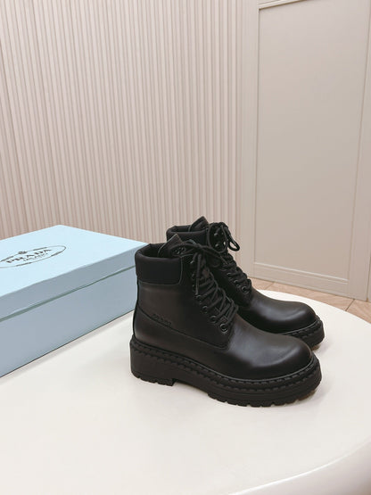 PRADA LACE-UP BOOTS BLACK CALFSKIN