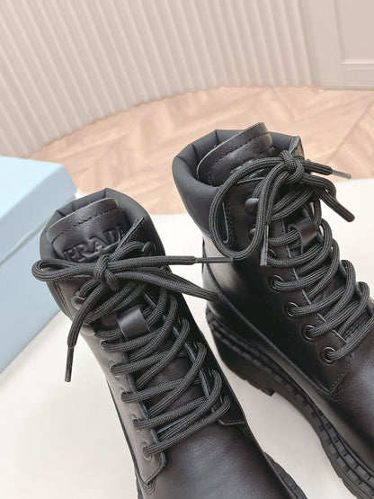 PRADA LACE-UP BOOTS BLACK CALFSKIN