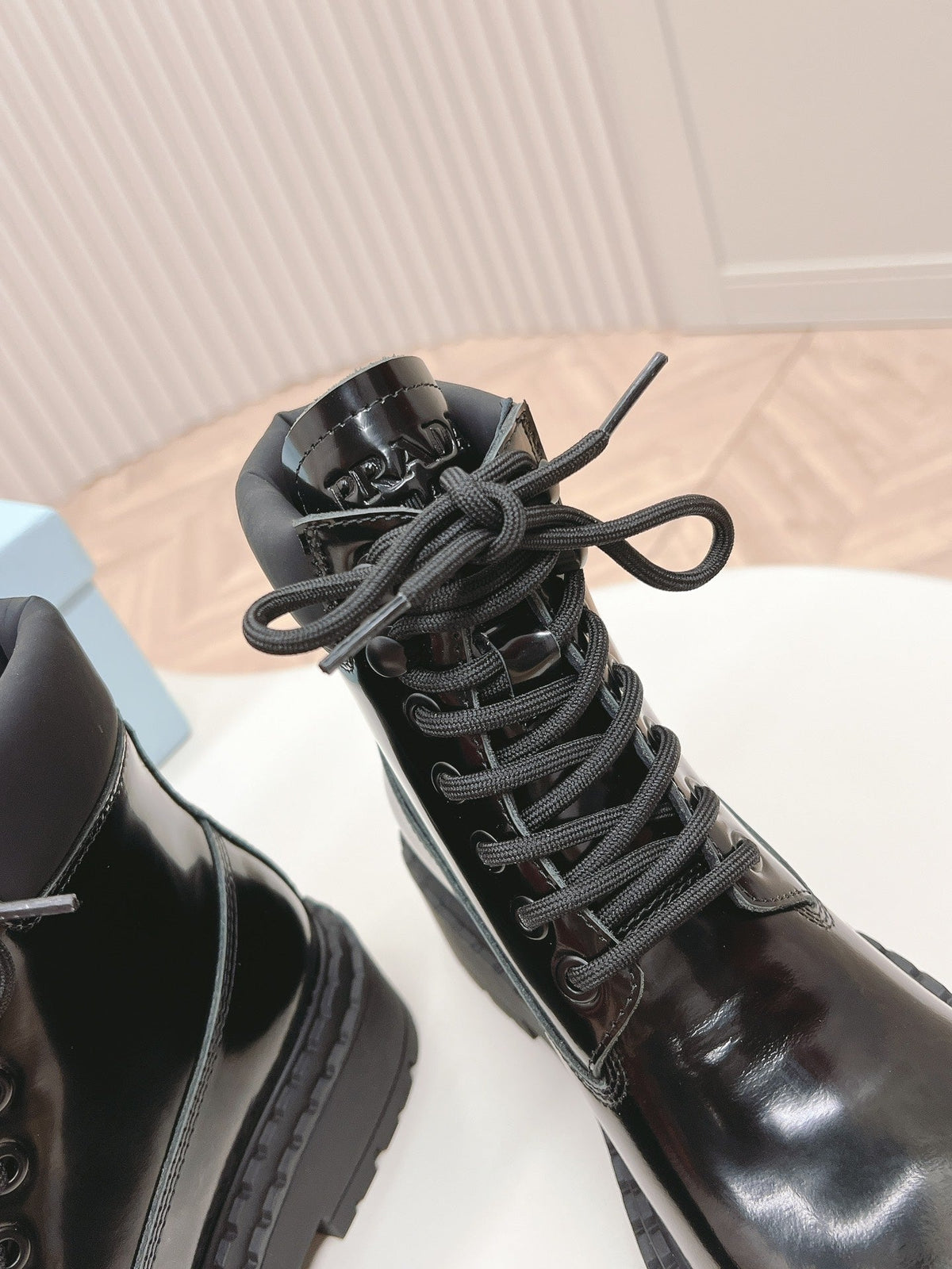 PRADA LACE-UP BOOTS GLOSSY BLACK CALFSKIN
