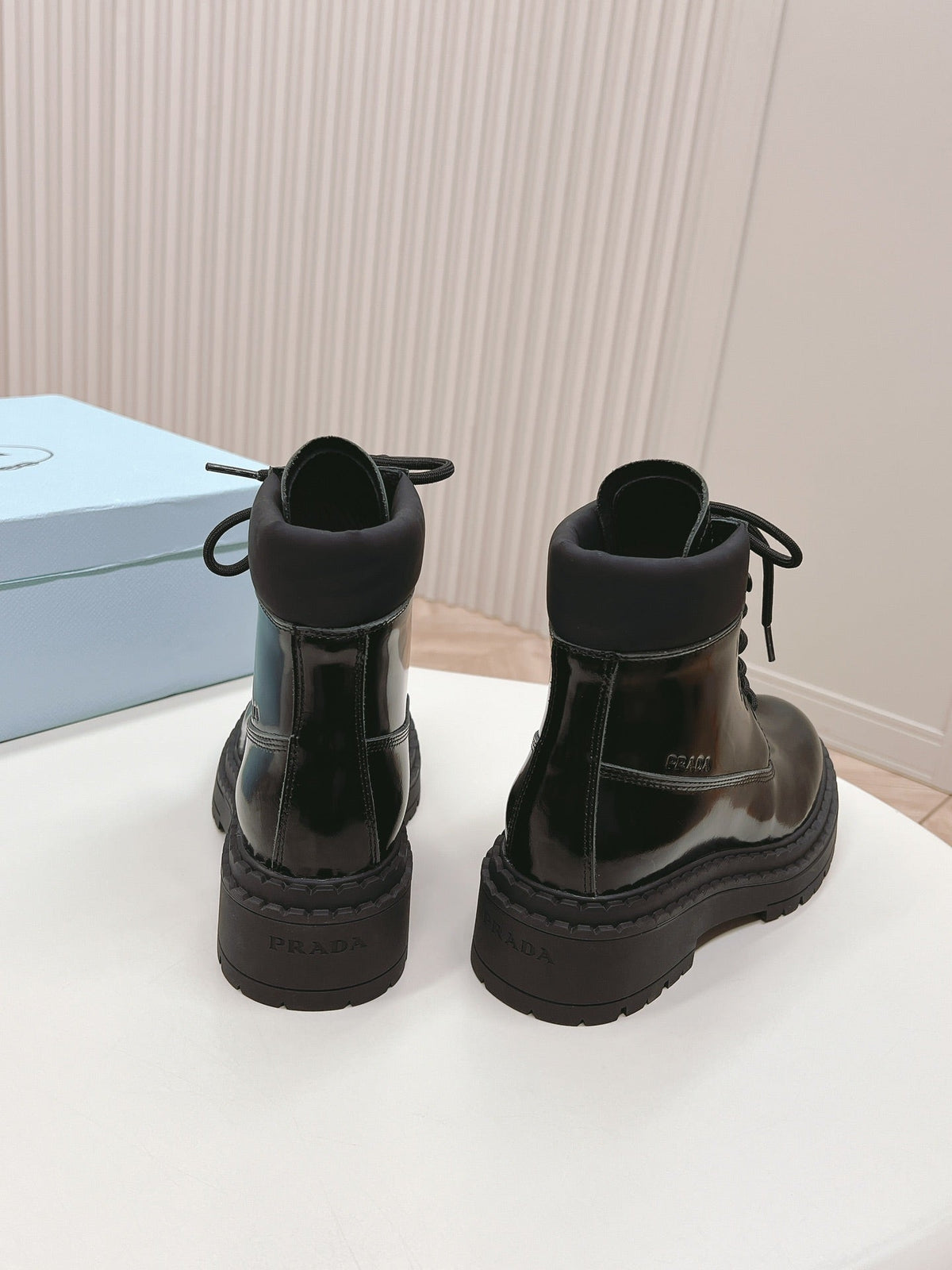PRADA LACE-UP BOOTS GLOSSY BLACK CALFSKIN