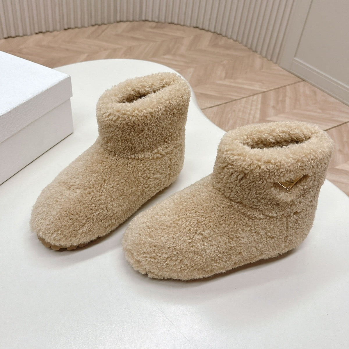 PRADA SNOW ANKLE BOOTS IN BEIGE SHEARLING