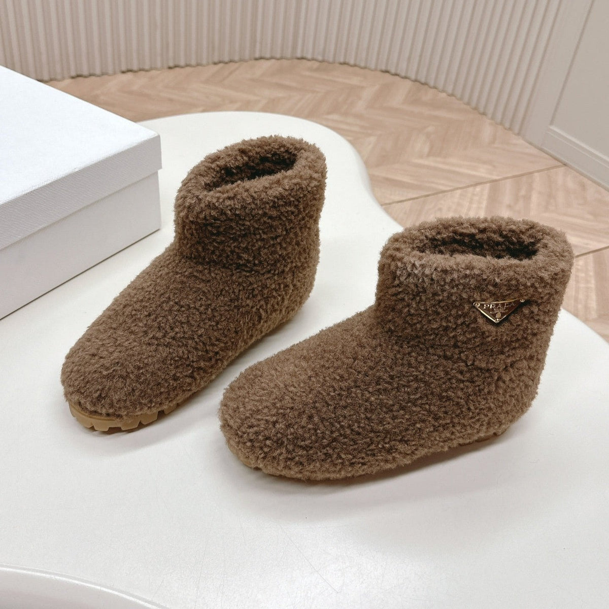 PRADA SNOW ANKLE BOOTS IN WOOD BROWN SHEARLING