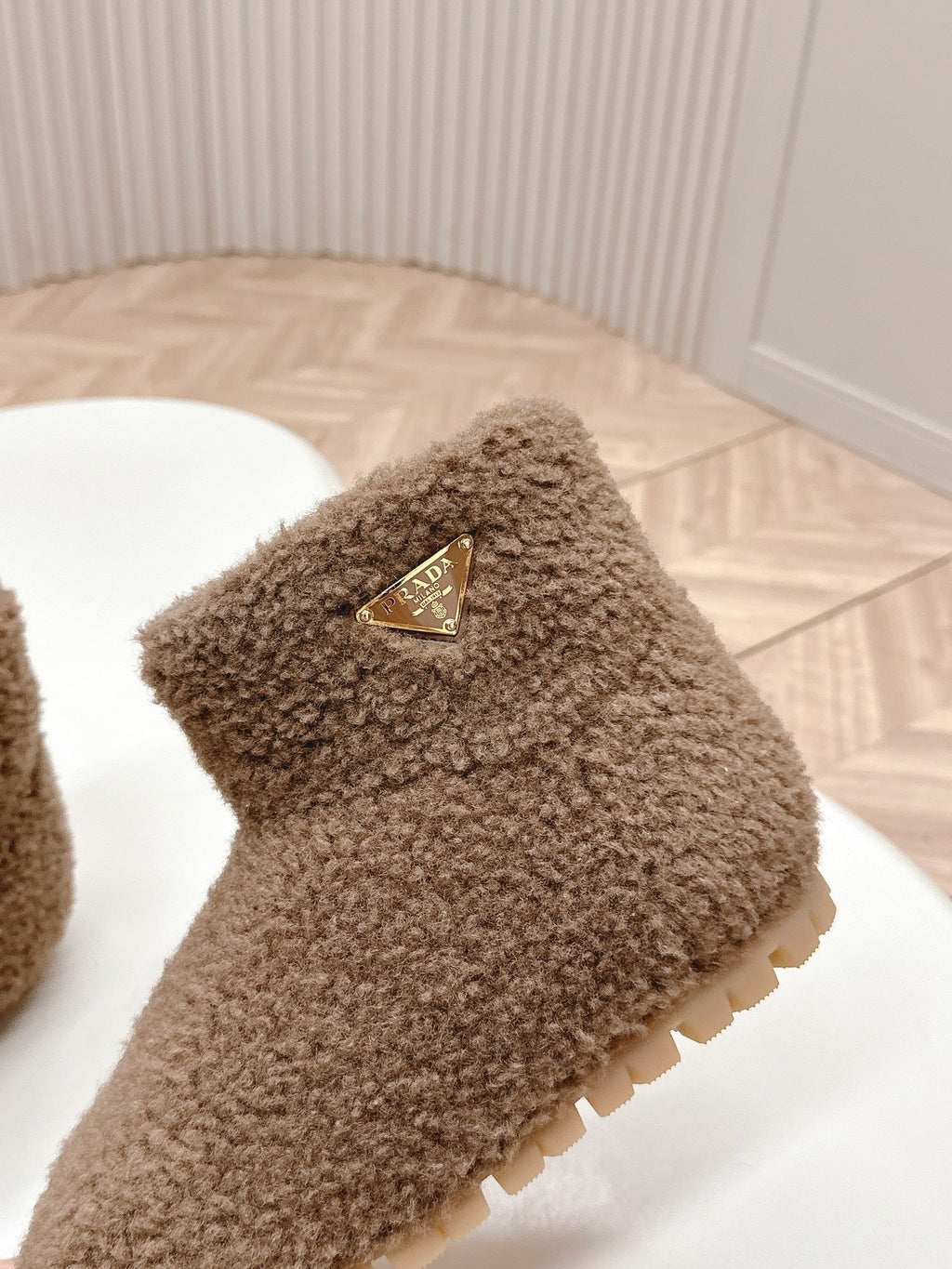 PRADA SNOW ANKLE BOOTS IN WOOD BROWN SHEARLING