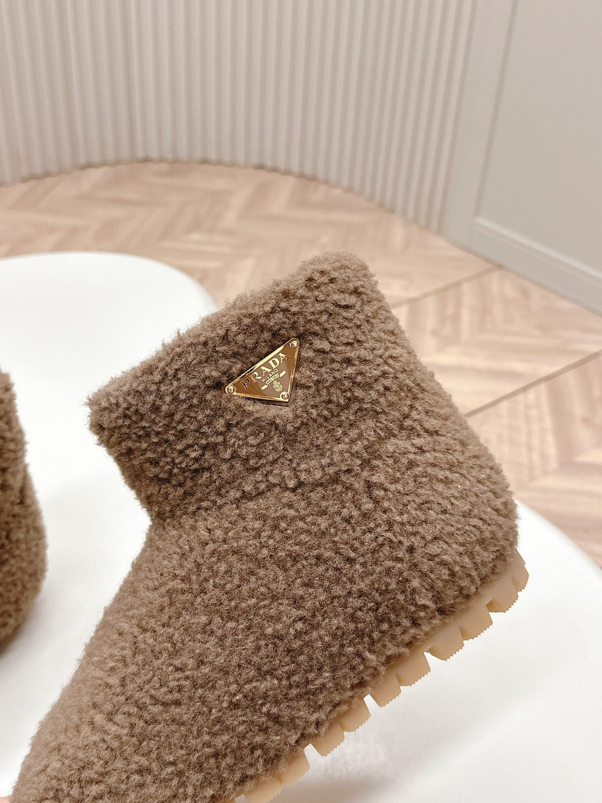 PRADA SNOW ANKLE BOOTS IN WOOD BROWN SHEARLING
