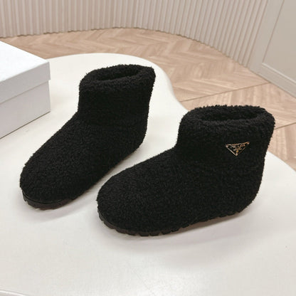 PRADA SNOW ANKLE BOOTS IN BLACK SHEARLING