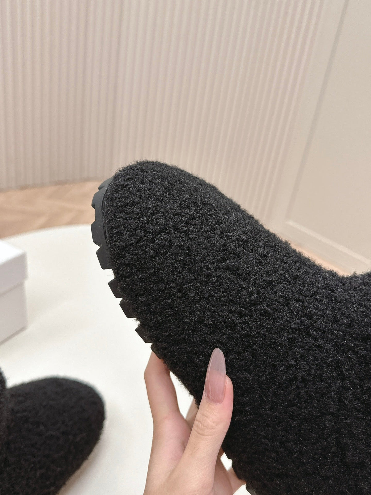 PRADA SNOW ANKLE BOOTS IN BLACK SHEARLING