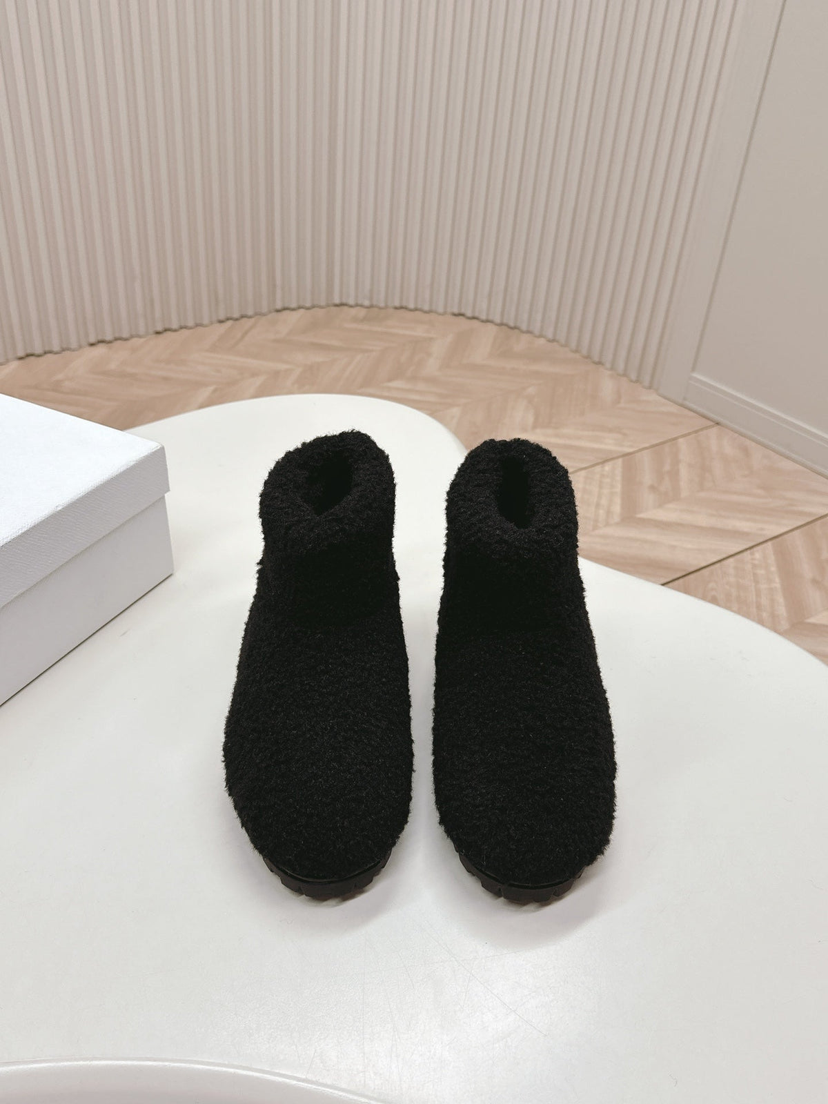 PRADA SNOW ANKLE BOOTS IN BLACK SHEARLING