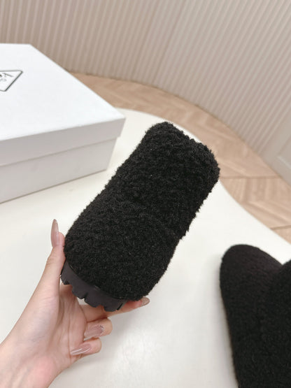 PRADA SNOW ANKLE BOOTS IN BLACK SHEARLING
