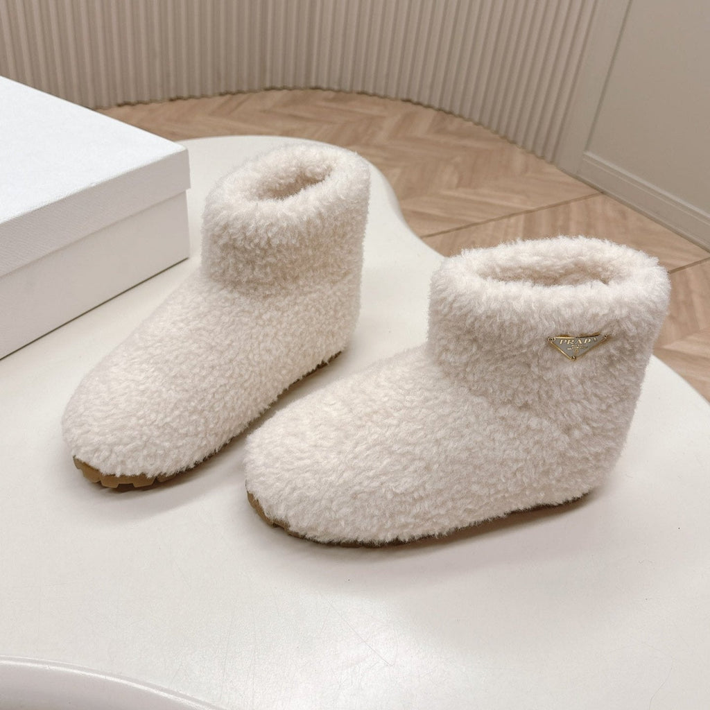 PRADA SNOW ANKLE BOOTS IN WHITE SHEARLING