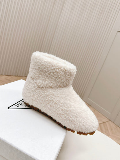 PRADA SNOW ANKLE BOOTS IN WHITE SHEARLING