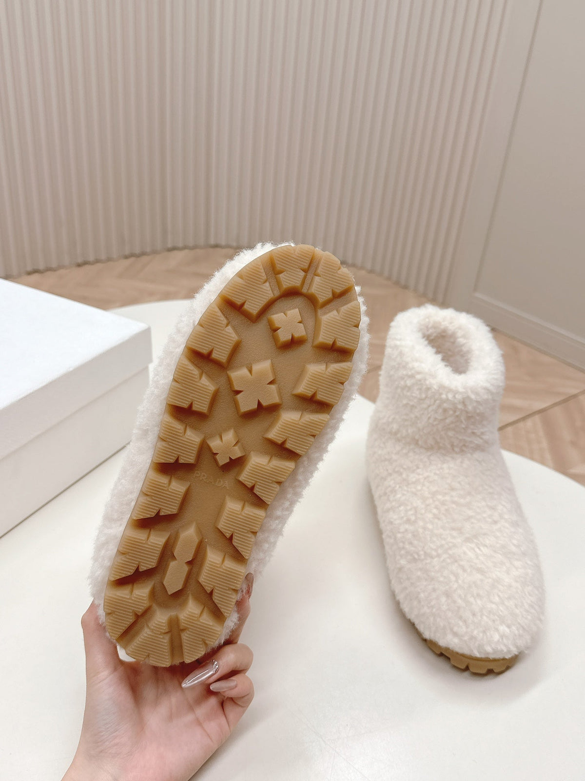 PRADA SNOW ANKLE BOOTS IN WHITE SHEARLING