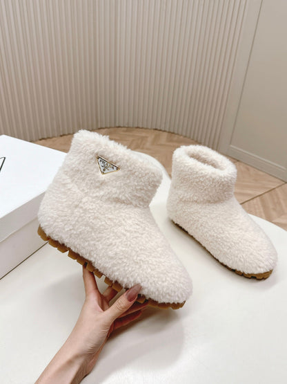 PRADA SNOW ANKLE BOOTS IN WHITE SHEARLING