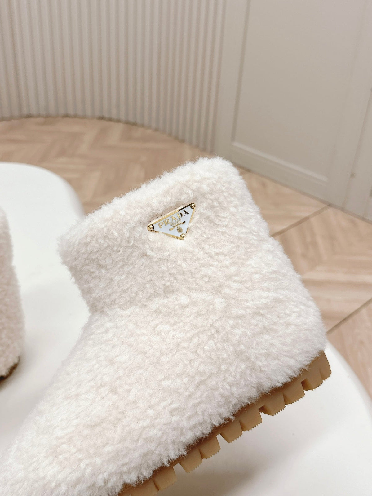 PRADA SNOW ANKLE BOOTS IN WHITE SHEARLING