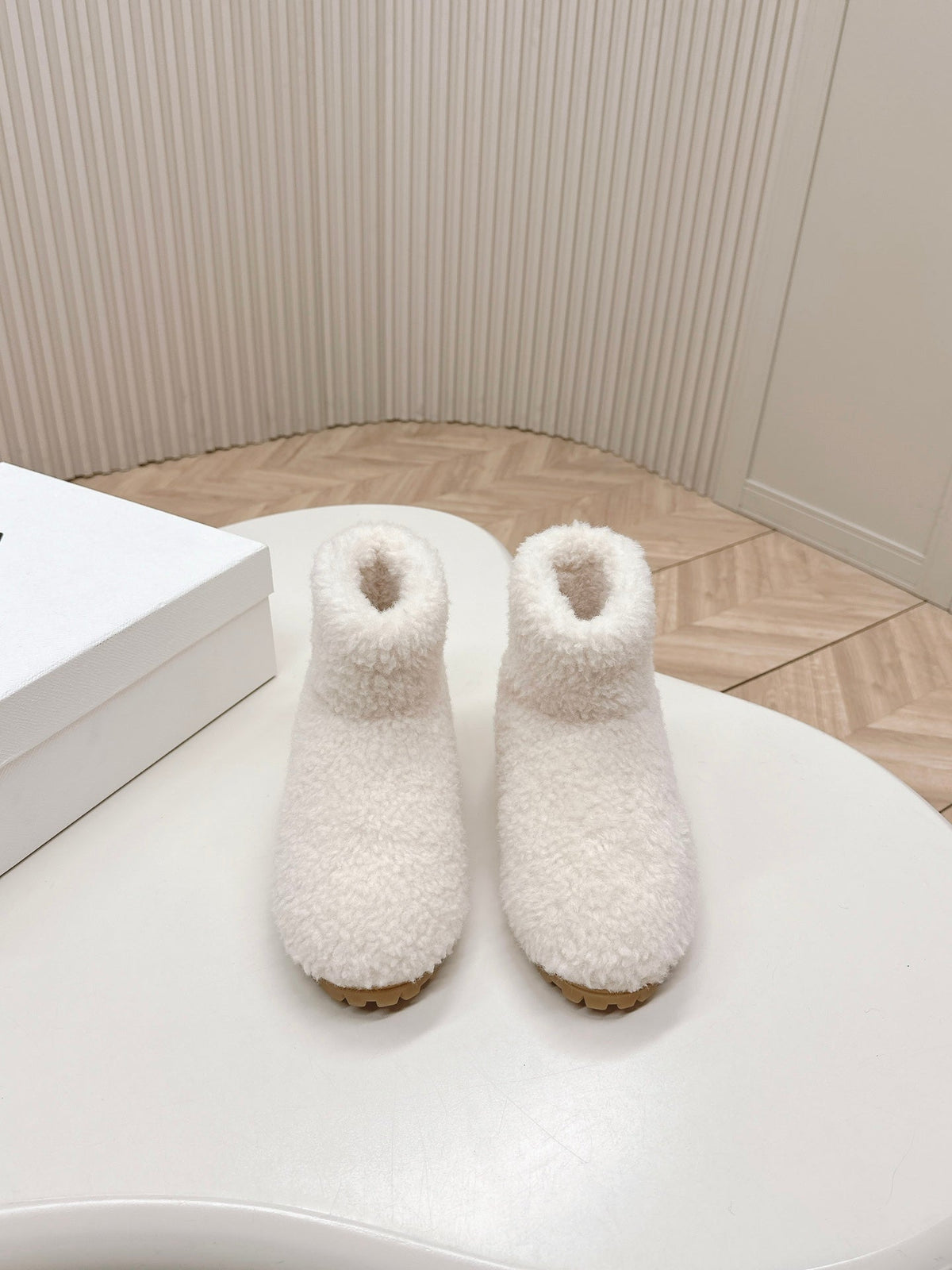 PRADA SNOW ANKLE BOOTS IN WHITE SHEARLING