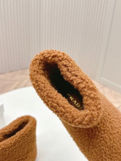 PRADA SNOW ANKLE BOOTS IN BRONZE BROWN SHEARLING