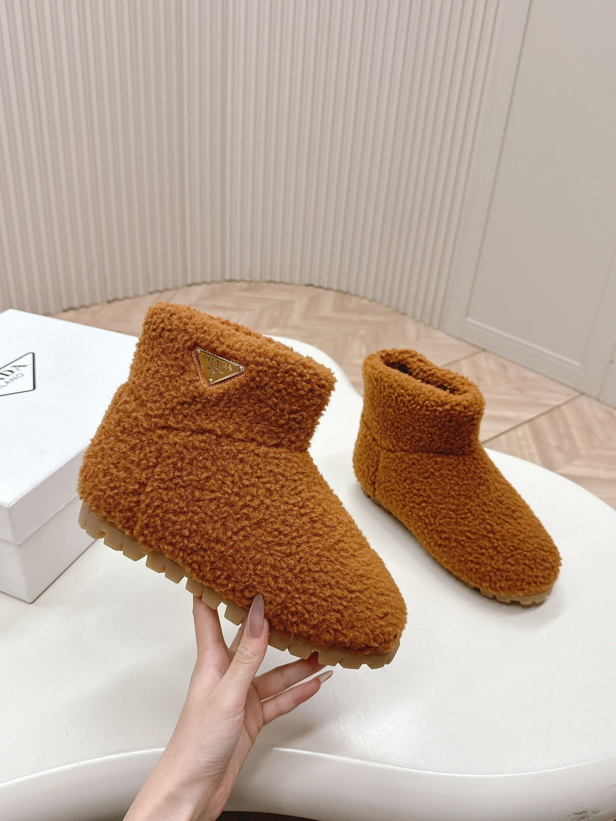 PRADA SNOW ANKLE BOOTS IN BRONZE BROWN SHEARLING