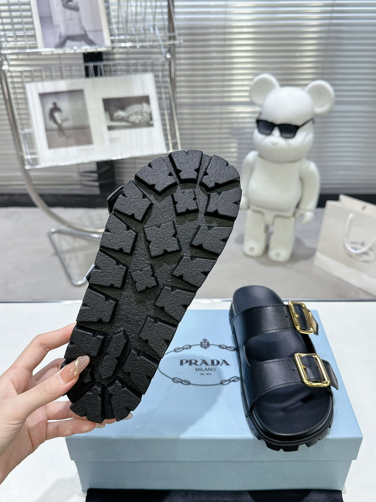 PRADA 25S STRAP SLIDES 30MM IN BLACK CALFSKIN GOLD HARDWARE