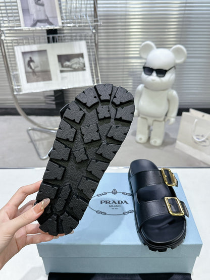 PRADA 25S STRAP SLIDES 30MM IN BLACK CALFSKIN GOLD HARDWARE