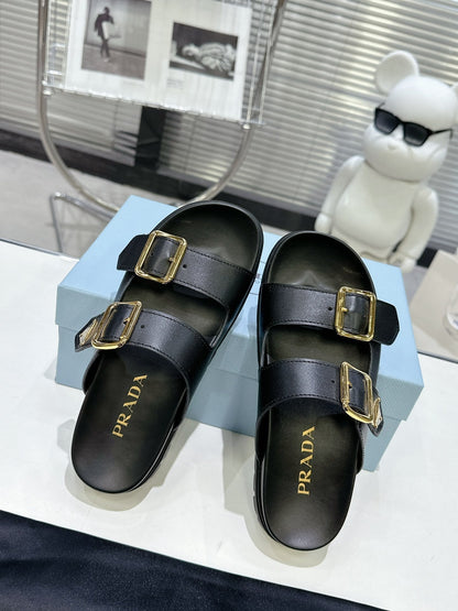 PRADA 25S STRAP SLIDES 30MM IN BLACK CALFSKIN GOLD HARDWARE