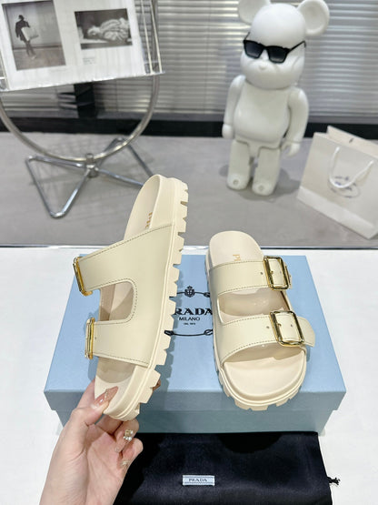 PRADA 25S STRAP SLIDES 30MM IN CREAM CALFSKIN GOLD HARDWARE