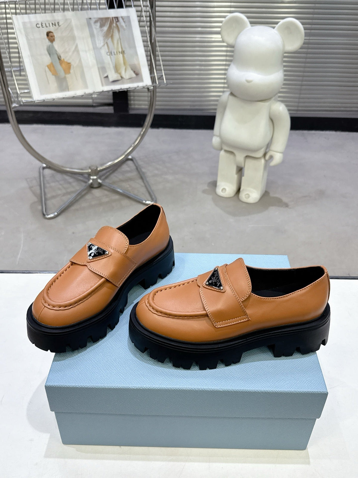PRADA 25S THICK-SOLE LOAFERS 60 MM IN COGNAC BROWN CALFSKIN