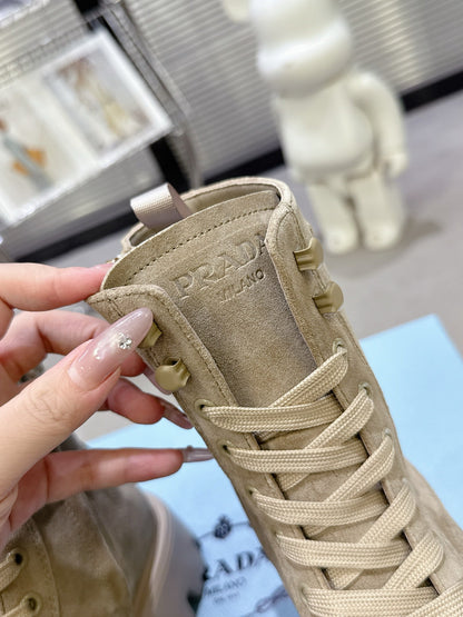 PRADA 25S WARRIOR BOOTS IN BEIGE SUEDE